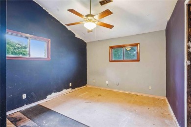 Endless Potential! Fixer-Upper Opportunity Close to Lake on Lake McBride Golf Course in Iowa - for sale on GolfHomes.com, golf home, golf lot