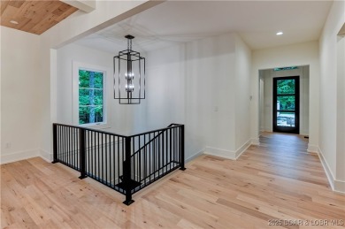 New Construction! This luxurious reverse  1.5 story 5 bedroom/3 on The Club At Porto Cima in Missouri - for sale on GolfHomes.com, golf home, golf lot