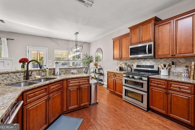 Beautiful four-bedroom, three-bath home located in the highly on Summergrove Golf Club in Georgia - for sale on GolfHomes.com, golf home, golf lot