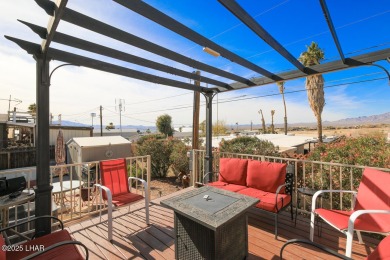 Step into this furnished 3-bedroom, 2-bath manufactured home on The Refuge Golf and Country Club in Arizona - for sale on GolfHomes.com, golf home, golf lot