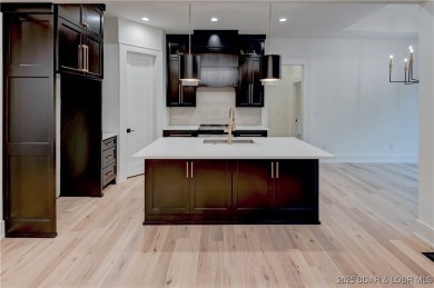 New Construction! This luxurious reverse  1.5 story 5 bedroom/3 on The Club At Porto Cima in Missouri - for sale on GolfHomes.com, golf home, golf lot