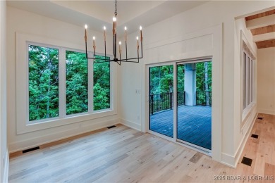 New Construction! This luxurious reverse  1.5 story 5 bedroom/3 on The Club At Porto Cima in Missouri - for sale on GolfHomes.com, golf home, golf lot
