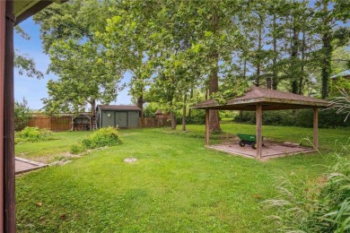 Endless Potential! Fixer-Upper Opportunity Close to Lake on Lake McBride Golf Course in Iowa - for sale on GolfHomes.com, golf home, golf lot