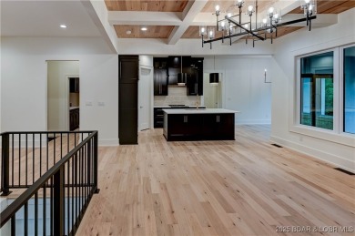 New Construction! This luxurious reverse  1.5 story 5 bedroom/3 on The Club At Porto Cima in Missouri - for sale on GolfHomes.com, golf home, golf lot