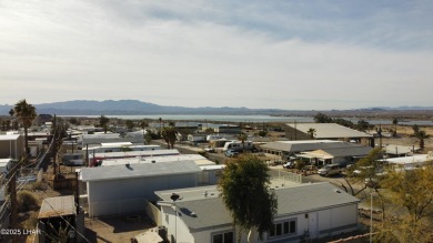 Step into this furnished 3-bedroom, 2-bath manufactured home on The Refuge Golf and Country Club in Arizona - for sale on GolfHomes.com, golf home, golf lot