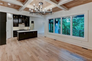 New Construction! This luxurious reverse  1.5 story 5 bedroom/3 on The Club At Porto Cima in Missouri - for sale on GolfHomes.com, golf home, golf lot