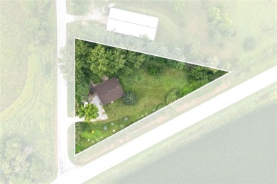 Endless Potential! Fixer-Upper Opportunity Close to Lake on Lake McBride Golf Course in Iowa - for sale on GolfHomes.com, golf home, golf lot