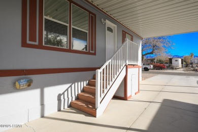 Step into this furnished 3-bedroom, 2-bath manufactured home on The Refuge Golf and Country Club in Arizona - for sale on GolfHomes.com, golf home, golf lot