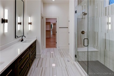 New Construction! This luxurious reverse  1.5 story 5 bedroom/3 on The Club At Porto Cima in Missouri - for sale on GolfHomes.com, golf home, golf lot