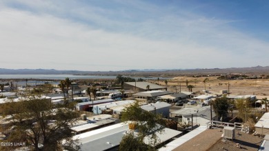 Step into this furnished 3-bedroom, 2-bath manufactured home on The Refuge Golf and Country Club in Arizona - for sale on GolfHomes.com, golf home, golf lot