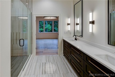 New Construction! This luxurious reverse  1.5 story 5 bedroom/3 on The Club At Porto Cima in Missouri - for sale on GolfHomes.com, golf home, golf lot