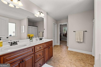 Beautiful four-bedroom, three-bath home located in the highly on Summergrove Golf Club in Georgia - for sale on GolfHomes.com, golf home, golf lot