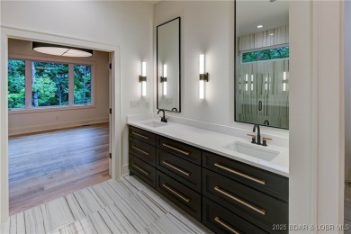 New Construction! This luxurious reverse  1.5 story 5 bedroom/3 on The Club At Porto Cima in Missouri - for sale on GolfHomes.com, golf home, golf lot