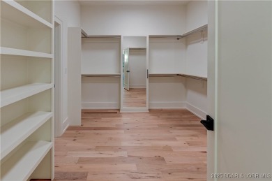 New Construction! This luxurious reverse  1.5 story 5 bedroom/3 on The Club At Porto Cima in Missouri - for sale on GolfHomes.com, golf home, golf lot