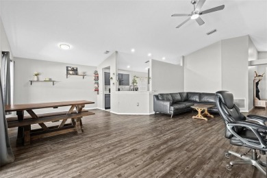 Step into this beautifully updated home, nestled in the scenic on Lexington Oaks Golf Club in Florida - for sale on GolfHomes.com, golf home, golf lot