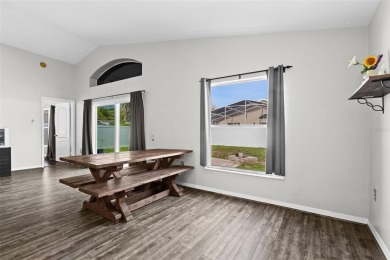Step into this beautifully updated home, nestled in the scenic on Lexington Oaks Golf Club in Florida - for sale on GolfHomes.com, golf home, golf lot