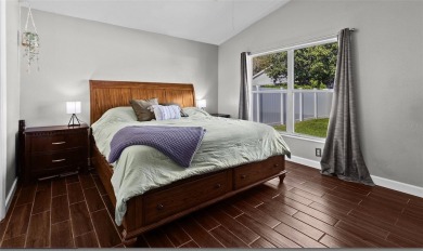 Step into this beautifully updated home, nestled in the scenic on Lexington Oaks Golf Club in Florida - for sale on GolfHomes.com, golf home, golf lot