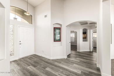 Situated on the wide 2nd fairway, this beautifully upgraded 3 on The Golf Club At Johnson Ranch in Arizona - for sale on GolfHomes.com, golf home, golf lot