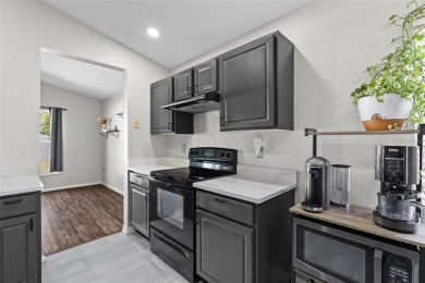 Step into this beautifully updated home, nestled in the scenic on Lexington Oaks Golf Club in Florida - for sale on GolfHomes.com, golf home, golf lot