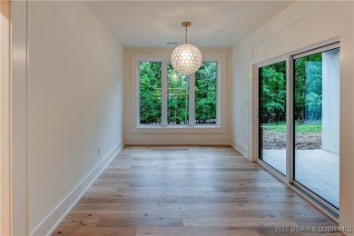 New Construction! This luxurious reverse  1.5 story 5 bedroom/3 on The Club At Porto Cima in Missouri - for sale on GolfHomes.com, golf home, golf lot