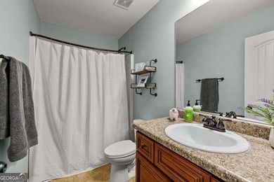 Beautiful four-bedroom, three-bath home located in the highly on Summergrove Golf Club in Georgia - for sale on GolfHomes.com, golf home, golf lot