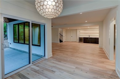 New Construction! This luxurious reverse  1.5 story 5 bedroom/3 on The Club At Porto Cima in Missouri - for sale on GolfHomes.com, golf home, golf lot