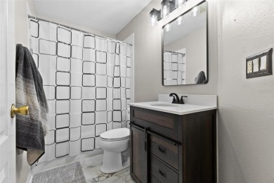 Step into this beautifully updated home, nestled in the scenic on Lexington Oaks Golf Club in Florida - for sale on GolfHomes.com, golf home, golf lot