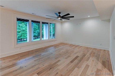 New Construction! This luxurious reverse  1.5 story 5 bedroom/3 on The Club At Porto Cima in Missouri - for sale on GolfHomes.com, golf home, golf lot