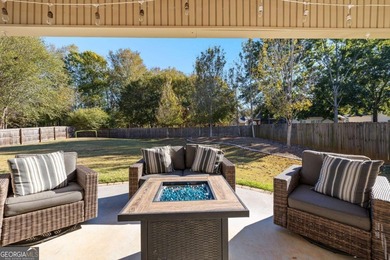 Beautiful four-bedroom, three-bath home located in the highly on Summergrove Golf Club in Georgia - for sale on GolfHomes.com, golf home, golf lot