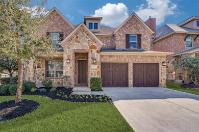 STUNNING Meritage built corner lot home located in the highly on The Tribute At the Colony in Texas - for sale on GolfHomes.com, golf home, golf lot