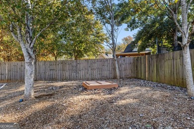 Beautiful four-bedroom, three-bath home located in the highly on Summergrove Golf Club in Georgia - for sale on GolfHomes.com, golf home, golf lot