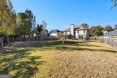 Beautiful four-bedroom, three-bath home located in the highly on Summergrove Golf Club in Georgia - for sale on GolfHomes.com, golf home, golf lot