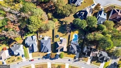 Beautiful four-bedroom, three-bath home located in the highly on Summergrove Golf Club in Georgia - for sale on GolfHomes.com, golf home, golf lot