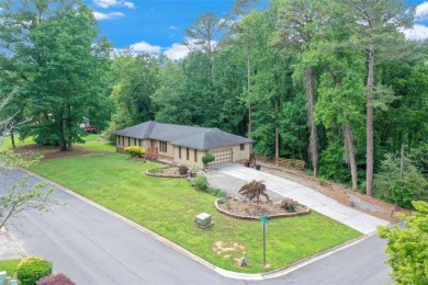 This hard-to-find Ranch-style home with a full finished basement on Collins Hill Golf Club in Georgia - for sale on GolfHomes.com, golf home, golf lot