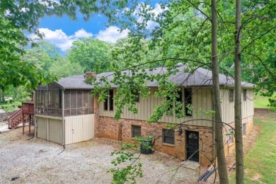 This hard-to-find Ranch-style home with a full finished basement on Collins Hill Golf Club in Georgia - for sale on GolfHomes.com, golf home, golf lot