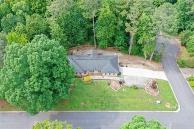 This hard-to-find Ranch-style home with a full finished basement on Collins Hill Golf Club in Georgia - for sale on GolfHomes.com, golf home, golf lot