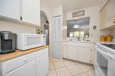 Lovely Highland Lakes villa located in Mission Grove. This villa on Highland Lakes Executive Golf Course in Florida - for sale on GolfHomes.com, golf home, golf lot