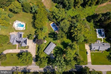 Have you been dreaming of a home with a large, heated pool? Look on Beckett Country Club in New Jersey - for sale on GolfHomes.com, golf home, golf lot