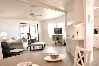 This lovely, 2/2 manufactured home on leased land in Lake on Pine Lakes Country Club in Florida - for sale on GolfHomes.com, golf home, golf lot