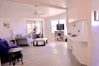 This lovely, 2/2 manufactured home on leased land in Lake on Pine Lakes Country Club in Florida - for sale on GolfHomes.com, golf home, golf lot