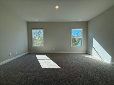 2 Story on a BASEMENT with a courtyard entry in resort style on Traditions of Braselton Golf Club in Georgia - for sale on GolfHomes.com, golf home, golf lot