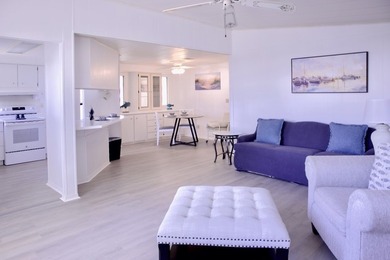 This lovely, 2/2 manufactured home on leased land in Lake on Pine Lakes Country Club in Florida - for sale on GolfHomes.com, golf home, golf lot