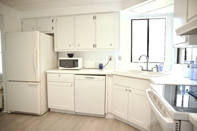 This lovely, 2/2 manufactured home on leased land in Lake on Pine Lakes Country Club in Florida - for sale on GolfHomes.com, golf home, golf lot