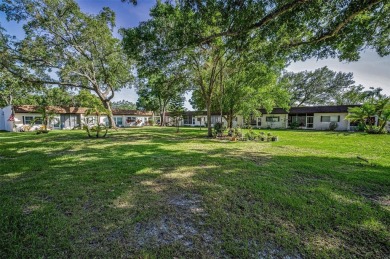 Lovely Highland Lakes villa located in Mission Grove. This villa on Highland Lakes Executive Golf Course in Florida - for sale on GolfHomes.com, golf home, golf lot