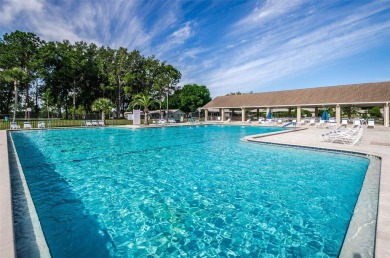 Lovely Highland Lakes villa located in Mission Grove. This villa on Highland Lakes Executive Golf Course in Florida - for sale on GolfHomes.com, golf home, golf lot