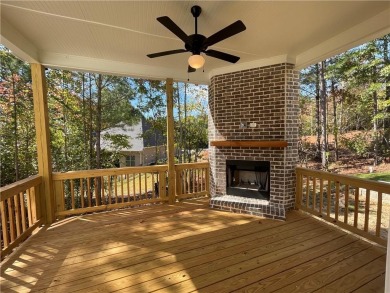 2 Story on a BASEMENT with a courtyard entry in resort style on Traditions of Braselton Golf Club in Georgia - for sale on GolfHomes.com, golf home, golf lot