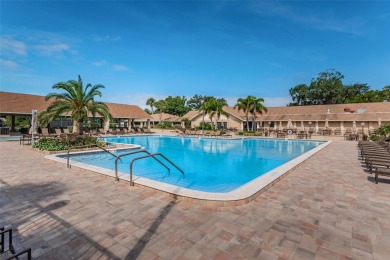 Lovely Highland Lakes villa located in Mission Grove. This villa on Highland Lakes Executive Golf Course in Florida - for sale on GolfHomes.com, golf home, golf lot