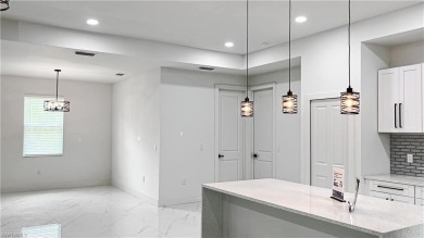 The best-priced BRAND NEW CONSTRUCTION on a HALF-ACRE LOT in on Lehigh Resort Club in Florida - for sale on GolfHomes.com, golf home, golf lot