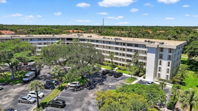 Fabulous location! Relax and take in the picturesque golf course on Palm-Aire Country Club and Resort - The Oaks in Florida - for sale on GolfHomes.com, golf home, golf lot