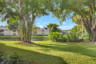 INTRODUCING A BEAUTIFULLY  RENOVATED 3 BED 2.1 BATH FIRST FLOOR on Boca West Golf and Country Club in Florida - for sale on GolfHomes.com, golf home, golf lot